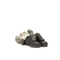 KAWS HOLIDAY JAPAN Vinyl Figure Brown